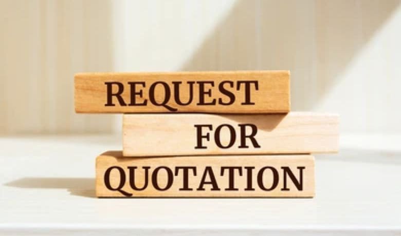 Three wooden blocks with the words "REQUEST FOR QUOTATION" stacked vertically
