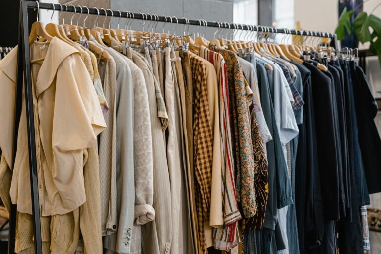 Assorted apparel hanging on a clothing rack for garment sourcing